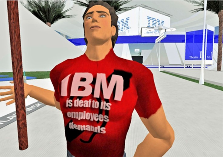 Ein Avatar hält ein Schild und trägt ein T-Shirt mit der Aufschrift "IBM is deaf to its employees demands". Symbolbild für den digitalem Streik in Second Life.